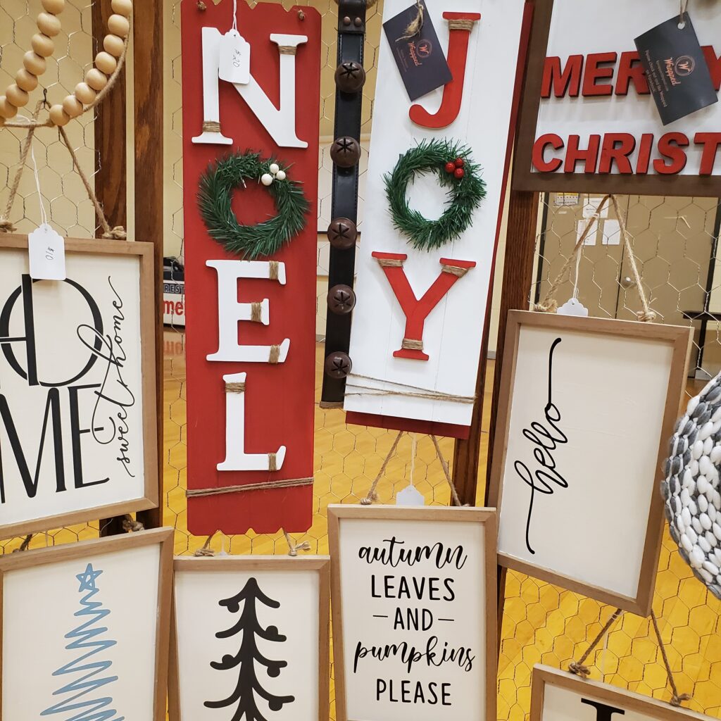 Various holiday signs created by Wrapped